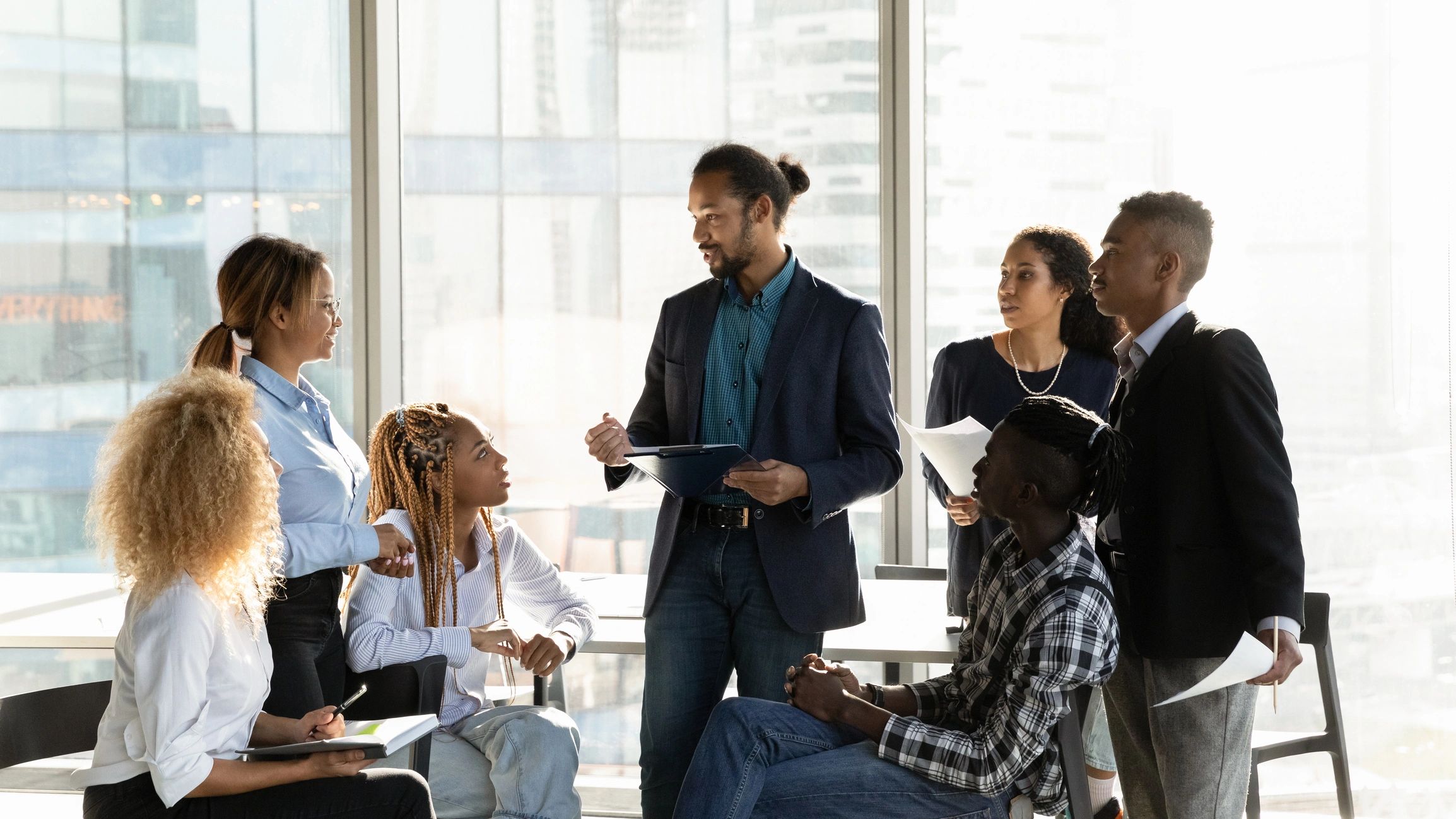 group mentoring leadership young professionals diverse modern coaching spiritual development