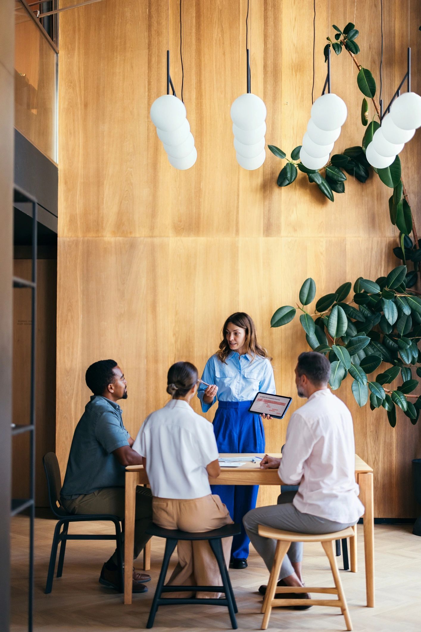 Group mentoring session with diverse young professionals